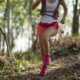 sportswoman-cross-country-trail-running-in-forest